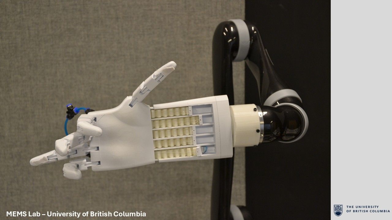 Final prosthetic hand mounted to a Kinova robotic arm in an open position